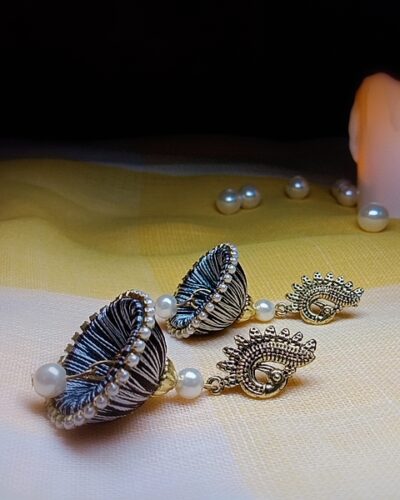 Black and White Silk Thread Medium Size Jhumkas With Peacock Stud