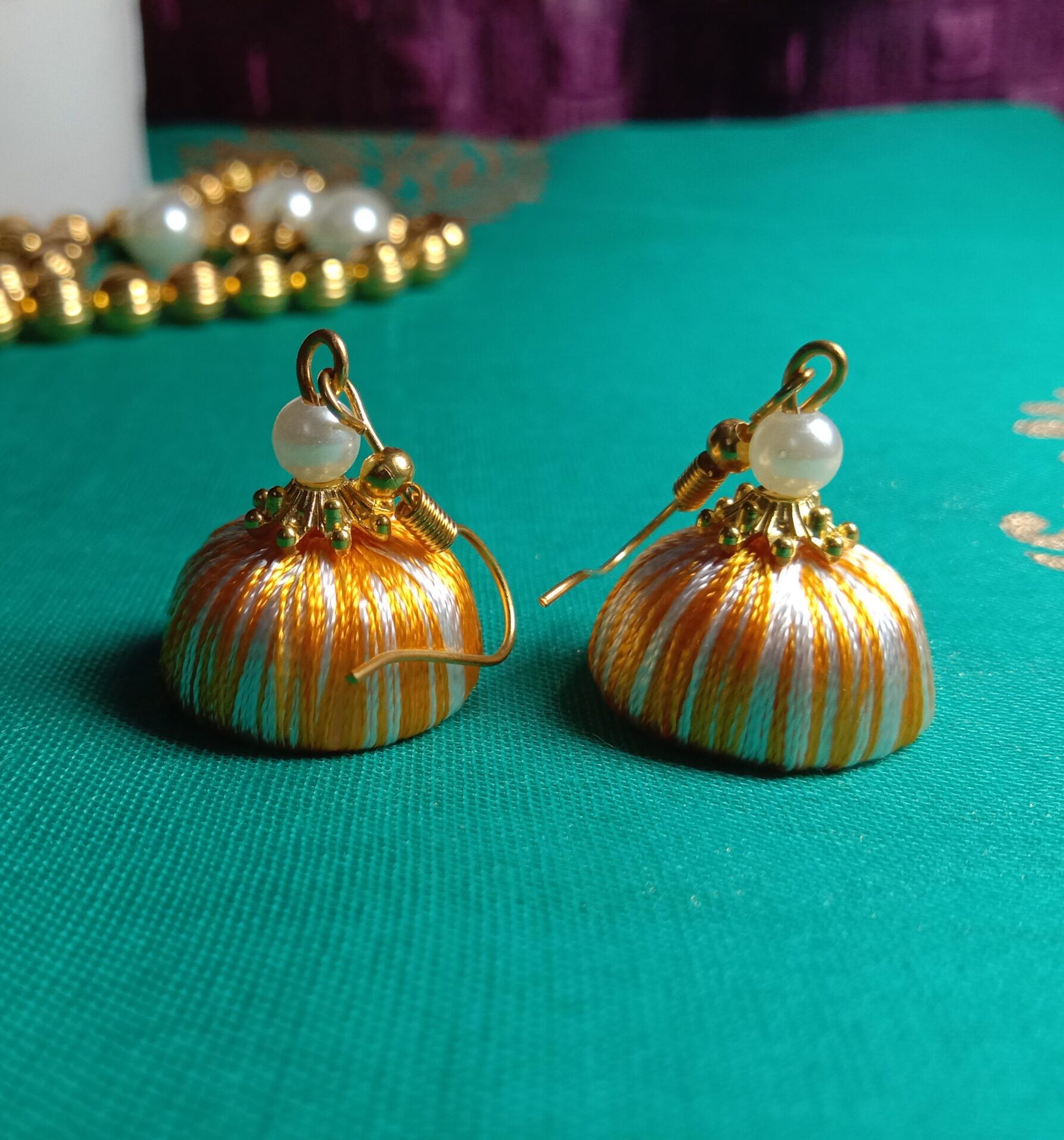 Mango and White Silk Thread Small Size Jhumkas with acrylic cap